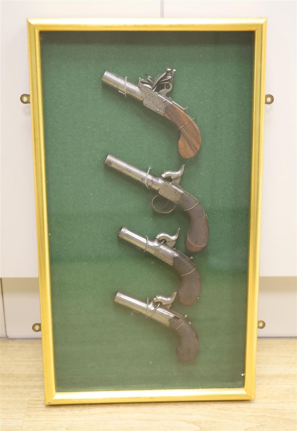 Four early 19th century boxlock percussion cap pocket pistols, consisting: a pair by Boaler (of Newark), one by Osborn, one other, all